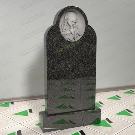 Памятник-барельеф девочкой и голубем